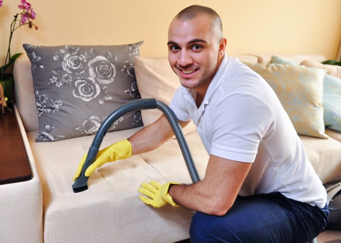Upholstery Cleaning service performed by professional cleaner in Sydney